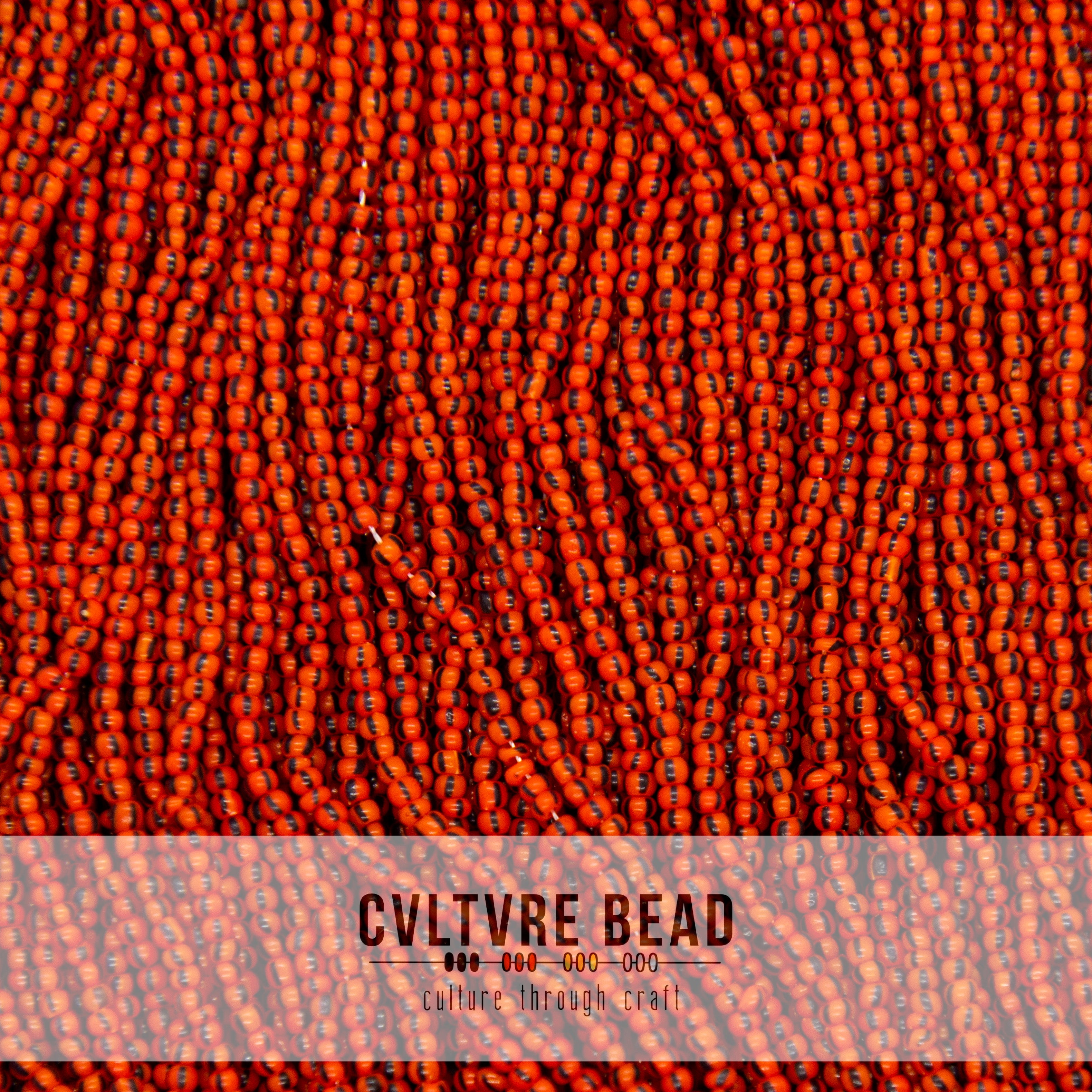 Czech Seed Bead 12/0 - Red Orange/Black Striped - 1 Hank